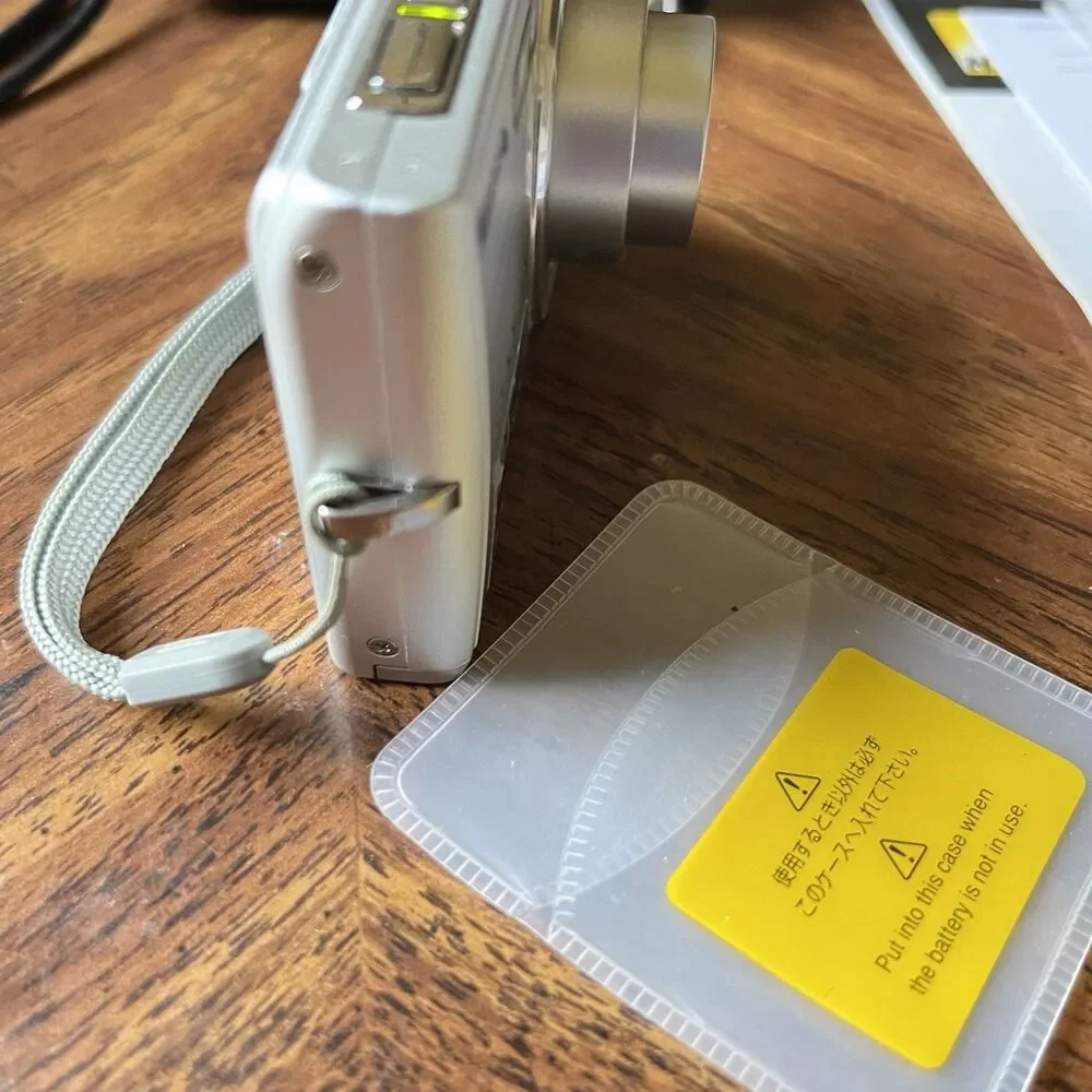Nikon Coolpix S200  Camera Package Works Silver Battery SD Card Case Manual 7.1